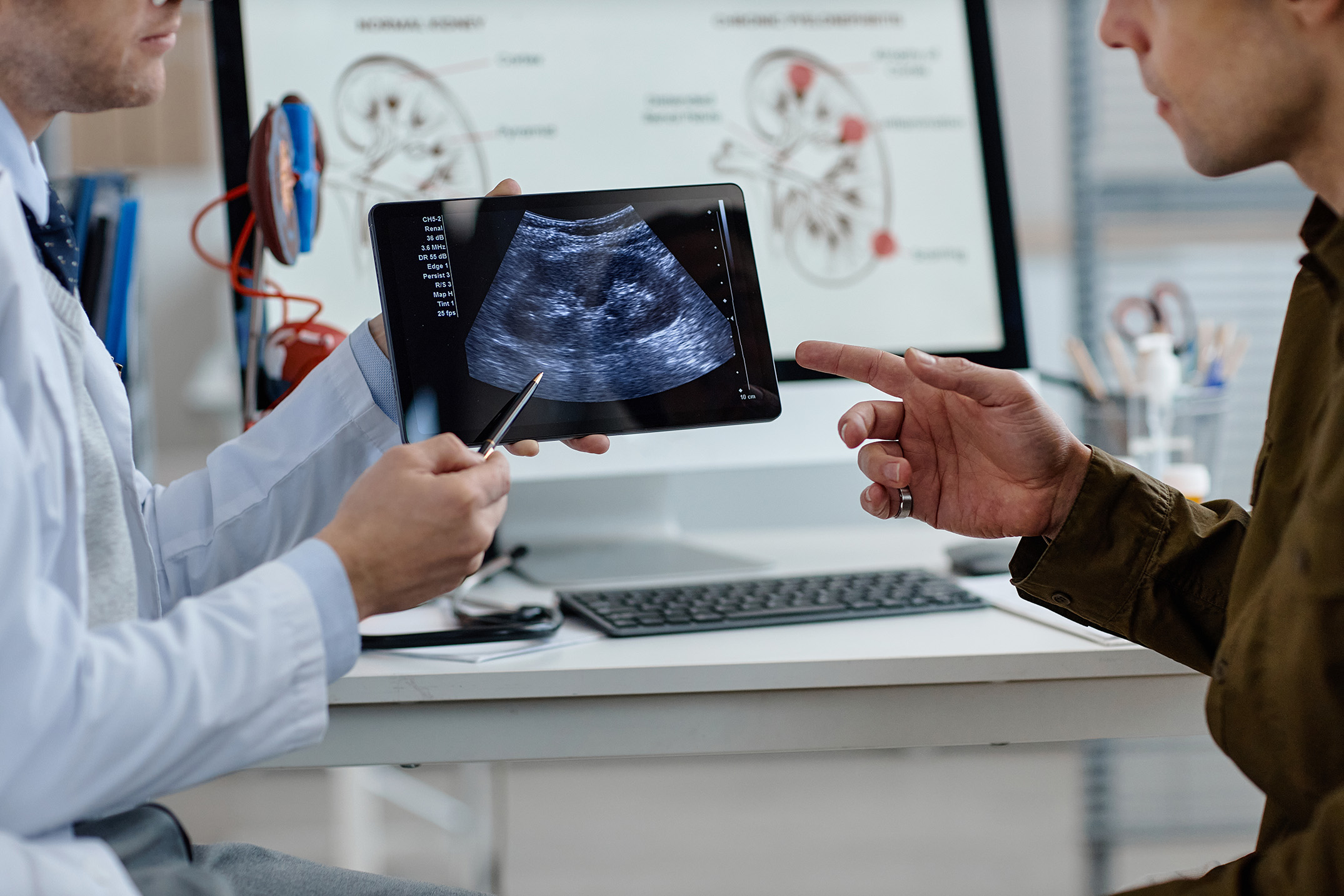 doctor and patient looking at scan